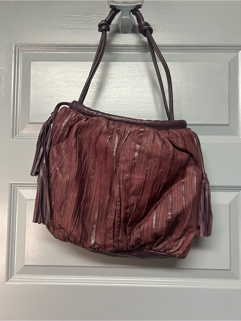 LUCKY PENNY  crushed /pleated  eggplant colored drawstring shoulder bag.